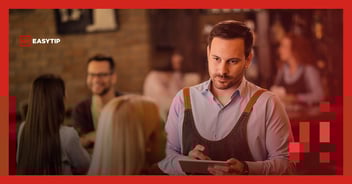 Man taking order at a restaurant with EasyTip logo top left